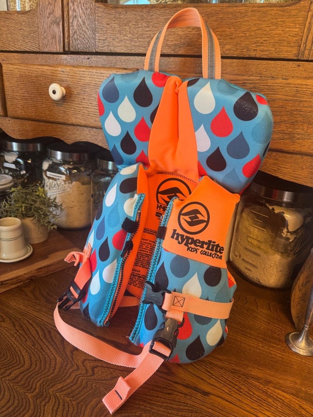 Hyperlite Kids' under 30 lb Life Jacket - Blue Teardrop Print with Coral Accents